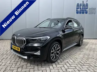 BMW X1 xDrive20i High Executive X-line Trekhaak Navigatie Zwart Leder Stoelverwarming 19 Inch Velgen