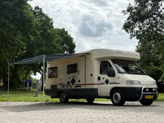 Fiat 230 CAMPER|draaistoelen|4p|trekhaak|fietsendrager met|luifel|twee bedden|zonnepanelen|keukenblo