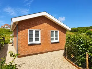 Knus duinhuisje vlak bij strand en bos en in De Koog