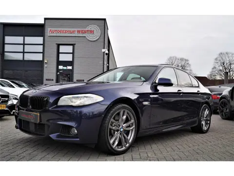 BMW 5-serie 550i High Executive | M-pakket | Adaptieve cruise | Botswaarschuwing | Trekhaak elektris