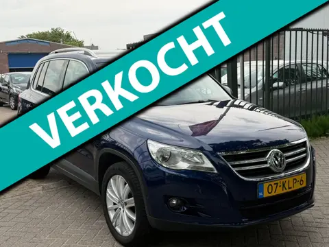 Volkswagen Tiguan 2.0 TSI Sport&Style 4Motion 2e eigenaar dealer onderhouden airco trekhaak parkeer 