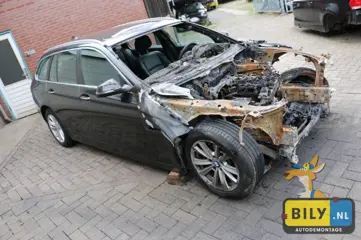 In onderdelen BMW F11 520dX '14 BILY brandschade