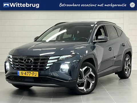 Hyundai Tucson 1.6 T-GDI PHEV Premium 4WD TREKHAAK | LEDER | NAVIGATIE | DEALER ONDERHOUDEN!