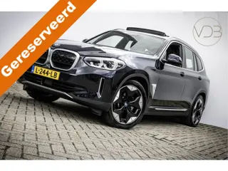 BMW iX3 High Executive 80 kWh PANO TREKHAAK LEER HARMAN KARDON 360GR CAM