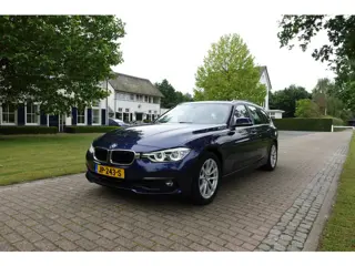 BMW 3 Serie Touring 330i Centennial Executive | Trekhaak | LED | Navi | PDC |