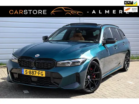 BMW 3-serie Touring 330e*M-Pakket*Dak*Trekhaak*112Dkm**Keyless*2023*Boston Green*INDIVIDUAL*