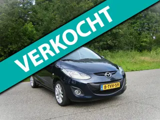 Mazda 2 1.3 TS Plus . 5 Drs . Airco . Stoelverwarming . Navigatie . Elec ramen . enz
