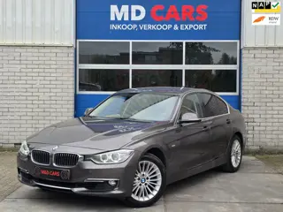 BMW 3-serie 320i Upgrade Edition AIRCO/CR CONTROL/NAVI/LEER