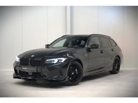 BMW 3 Serie Touring 330i xDrive High Excecutive M Sport | M Performance | Stoelverwarming | Camera |