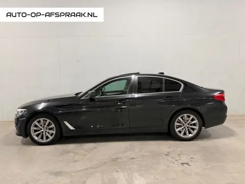 BMW 5-serie 520i Pano Dak Navi Leer Clima Cruise PDC