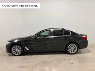 BMW 5-serie 520i Pano Dak Navi Leer Clima Cruise PDC