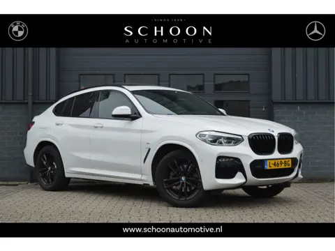 BMW X4 xDrive20i High Executive | M-PAKKET | PANO | TREKHAAK | HUD | HIFI | CAM |
