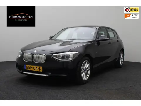BMW 1-serie 116i Business+ 2012 | Navigatie | Cruise Control | Stoel Verwarming | Parkeersensoren | 