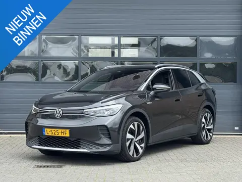 VOLKSWAGEN ID.4 FIRST 77 kWh (SOH 89%) I AUTOMAAT I TREKHAAK I WARMTEPOMP I P-CAMERA I STOELVERWARMI