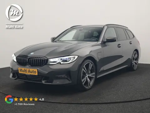 BMW 3 Serie Touring 330e Sportline PHEV 293pk Dealer O.H. | Dravitgrau | Trekhaak Af Fabriek | Adapt