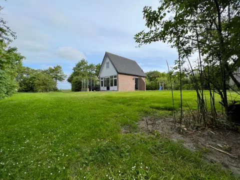 Met uitzicht op boomgaard gelegen vakantiehuis