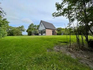 Met uitzicht op boomgaard gelegen vakantiehuis