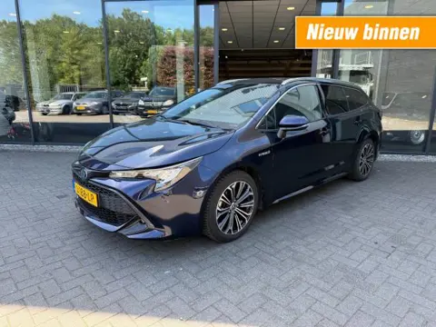 TOYOTA COROLLA Touring Sports 1.8 Hybrid Business+,Half Leer,LED,Stoelverw,Camera,Adapt Cruise,Navi,Carplay,Lane Ass.,