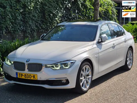 BMW 3-serie 320i Luxury Edition Individual Schuifdak Apple CarPlay Virtual dash Camera LED NAP 2e ei