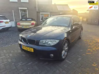 BMW 1-serie 120i Anniversary Automaat Navi Clima Cruise Schuif/kanteldak 17 Inch Leer
