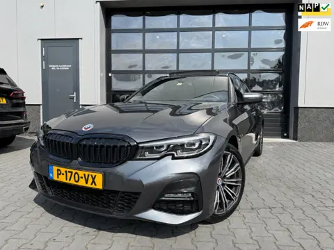 BMW 3-serie Touring 320e Business M-SPORT Panoramadak sportstoelen