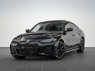 BMW i4 eDrive40 High Executive 84 kWh M-Pakket M-sportstoelen Schuif/kantel HuD