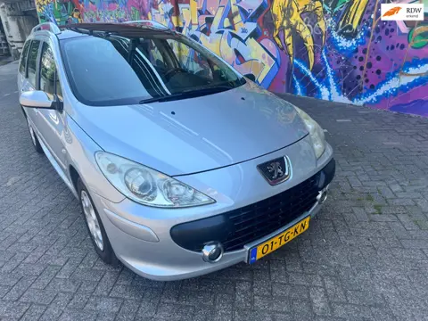 Peugeot 307 SW 1.6-16V panorama dak airco 7 personen uitvoering rijd goed nette auto facelift model 
