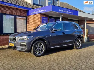 BMW X5 XDrive45e High Executive H&K Panorama Laser El. Trekhaak Head Up Comfortstoelen ACC Warmte-co