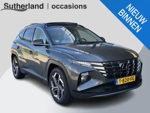 Hyundai Tucson 1.6 T-GDI HEV Premium Sky 230pk | VOL! | Trekhaak | Pano | Leder | Stoel- Verwarming 