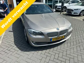 BMW 5 Serie Sedan 535i Upgrade Edition Active Hybride airco/ecc leer