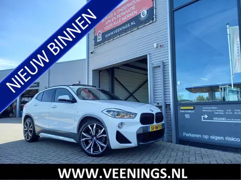 BMW X2 sDrive20i High Executive M-SPORT - PANO - HUD - TREKHAAK - LEER - CAMERA - PDC V/A - STOELVER