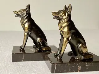 Stel Art Deco boekensteunen voorstelling van Duitse