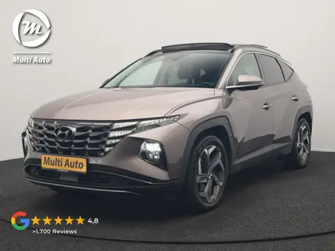Hyundai Tucson 1.6 T-GDI Premium Sky 4WD PHEV 265pk Dealer O.H | Trekhaak | Panodak | Adaptive Cruis
