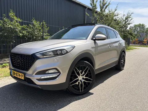 Hyundai Tucson 1.6 T-GDi Premium / PANORAMADAK / LEER / NAVI / CRUISE / TREKHAAK / 140dkm!