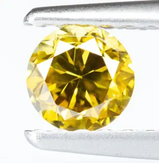 Diamant - 0.31 ct - Natural Fancy Vivid Orangy Yellow - VS2