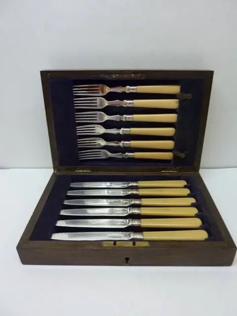 Antique wooden box with 12 piece cutlery Frederik C. Asman