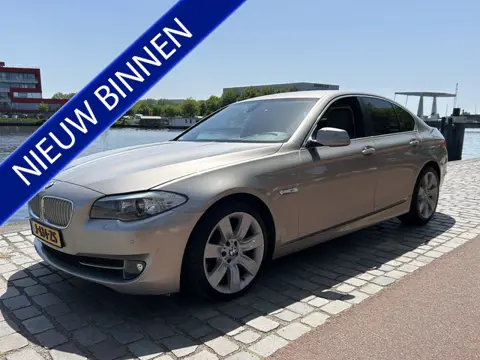 BMW 5 Serie Sedan 535i Upgrade Edition Active Hybride airco/ecc leer