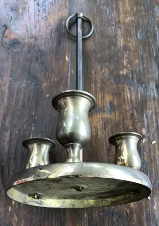 Koperen kaarsenhouder.