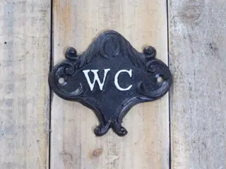 Wegwijzer naar de toilet, deur teken, metaal, wc