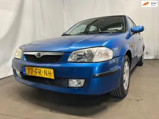Mazda 323 Fastbreak 1.5i LX - Roest - Schade