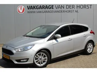 Ford Focus 1.0-125pk Titanium. Uiterst nette Ford Focus, slechts 54.000km ! Autm. airco dual, trekha