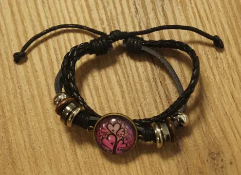 Leren gevlochten cabochon armband " Hartjes "