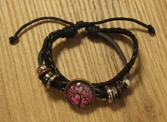Leren gevlochten cabochon armband " Hartjes "