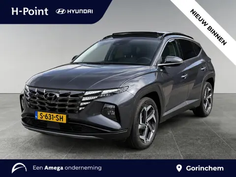 Hyundai Tucson Premium Sky 1.6 T-GDI HEV 230pk | SCHUIF/KANTELDAK | LEDER | STOELVENTILATIE + VERW. 