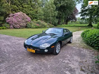 Jaguar XKR 4.0 V8 Coupé - British Racing Green - Lage KM - Historie bekend - zeer mooi