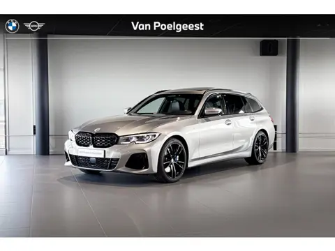 BMW 3 Serie Touring M340i xDrive | Glazen Panoramadak | Harman Kardon | Stoelverwarming | Head-Up Di