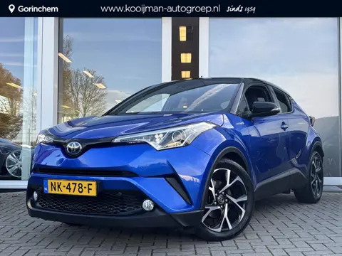 Toyota C-HR 1.8 Hybrid Bi-Tone | Navigatie | Stoelverwarming | Trekhaak | Adaptive Cruise Control | 