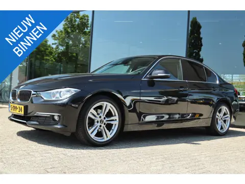 BMW 3-SERIE 316I HIGH EXECUTIVE AUT. | LEDER | NAVI | STOELVERW. | PDC | LMV