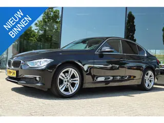 BMW 3-SERIE 316I HIGH EXECUTIVE AUT. | LEDER | NAVI | STOELVERW. | PDC | LMV
