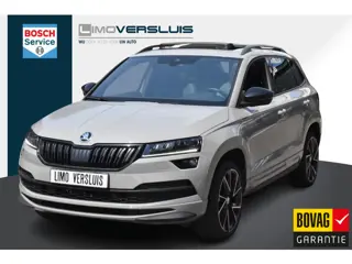 Skoda Kamiq 1.5 TSI ACT Sportline Business Panorama | BSM | Navigatie | Trekhaak | Half-Leder | 12 m